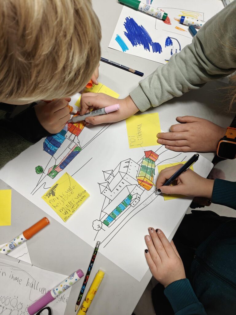 Lapset suunnittelemassa linnan valaisua