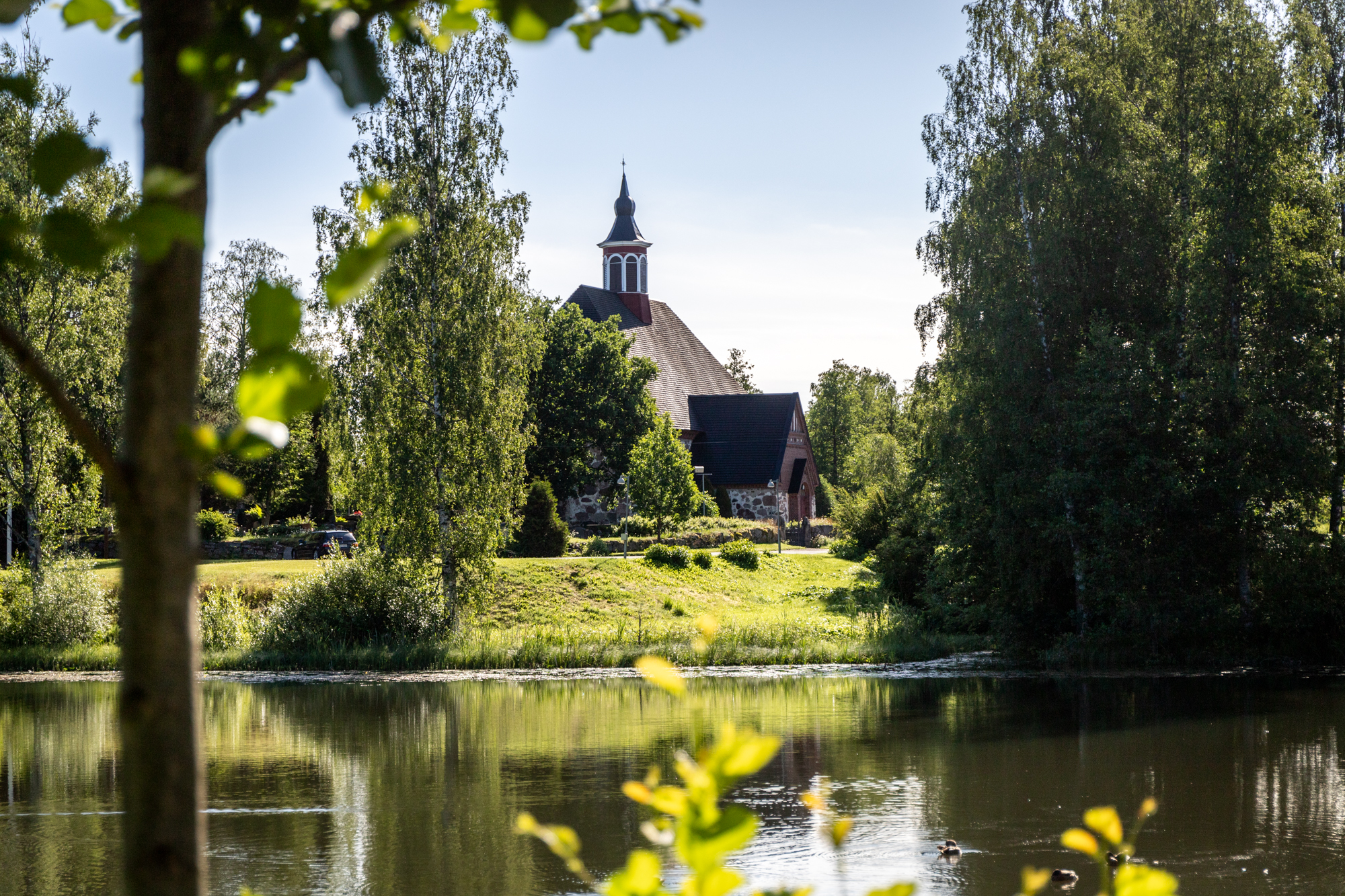 Renko Church by the lake in summer.