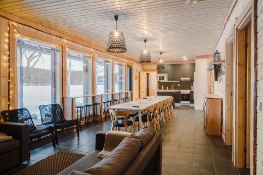 A bright lounge and meeting area with large windows before guests arrive.