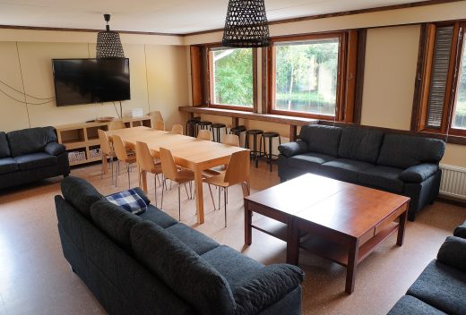 Meeting space with versatile seating and tables.