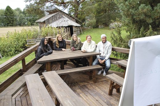 Iloranta staff sitting outside at a table.