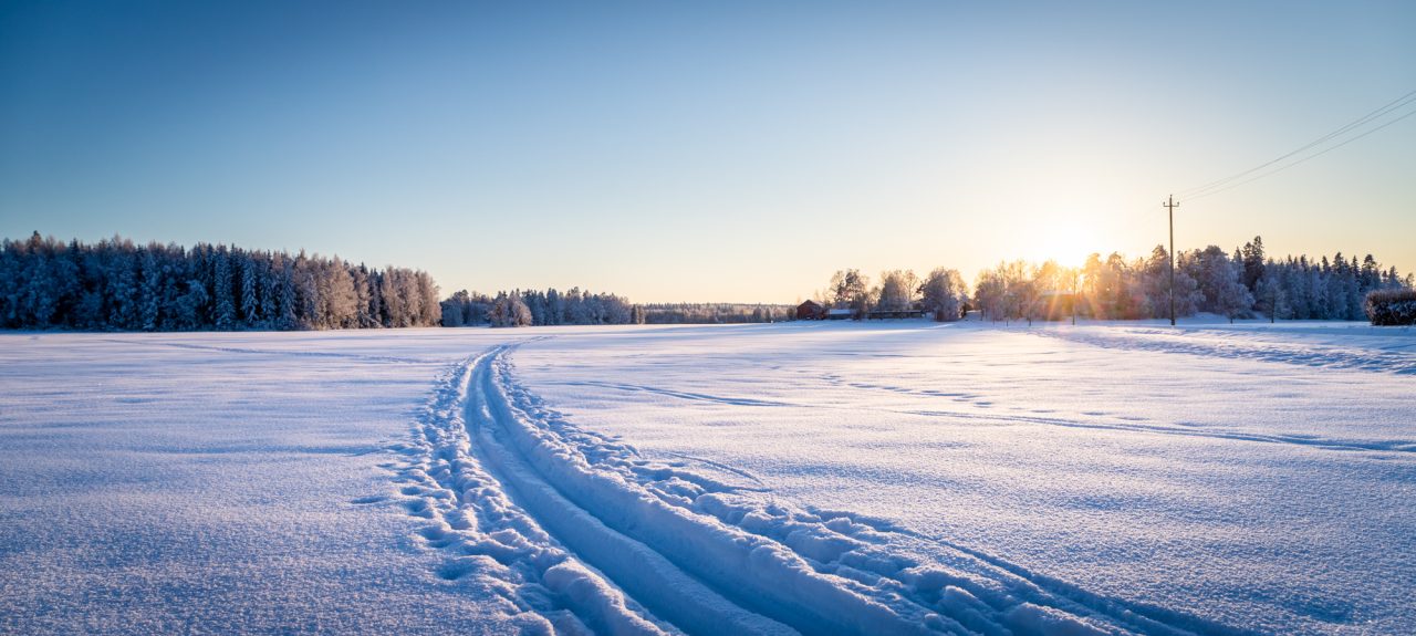 Self-made ski track on an open field