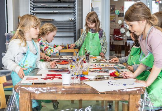 Young pupils from Aimokoulu working in the art classroom.